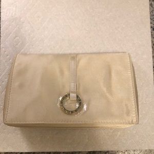 NWOT cream color satin BULGARI clutch purse with cosmetic mirror & zipper pocket